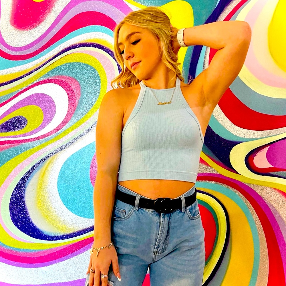 Soft and stretchy Y-back crop top. One size fits all. White, mauve, light blue